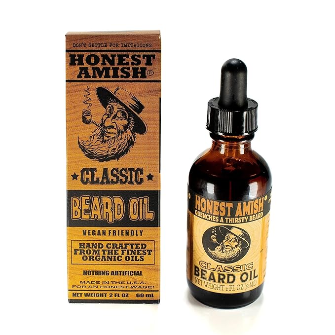 Stylish bearded man smiling confidently – benefits of regular beard oil care.
